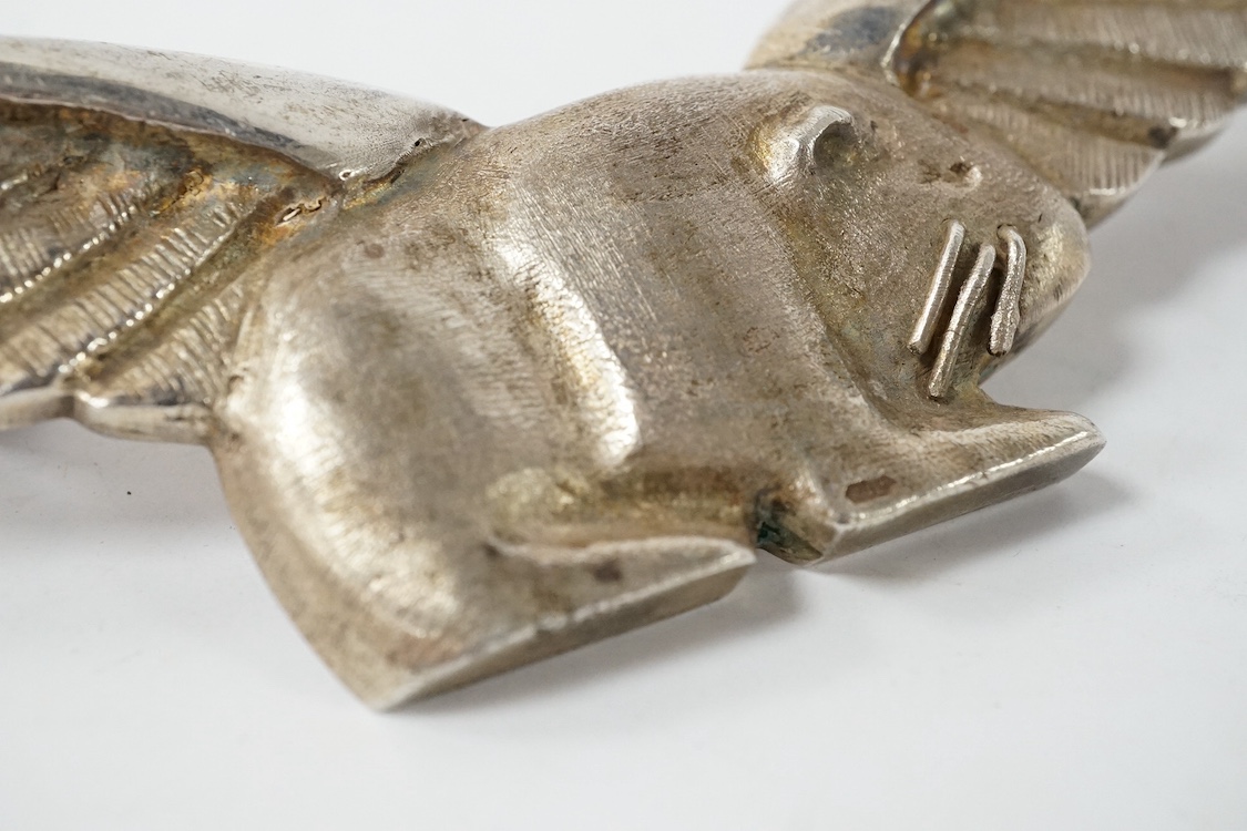 A 1980s unmarked over scale prototype for the Flying Guinea Pigs cap badge/label badge, possibly commissioned by Queen Victoria Hospital, East Grinstead or the RAF Benevolent Fund, 154g, no hall marks but tests as silver
